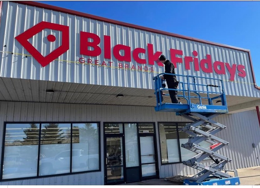 Channel letter storefront sign install in Hayward Wisconsin