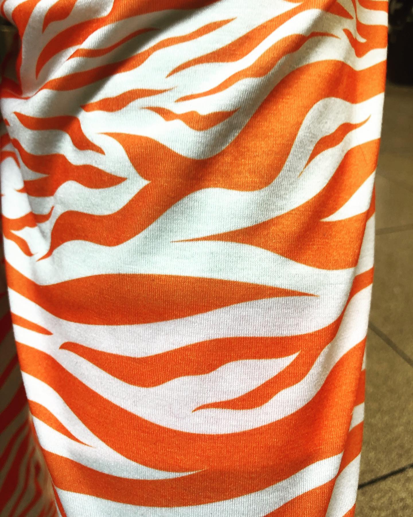 Vivid orange sublimated fabric detail